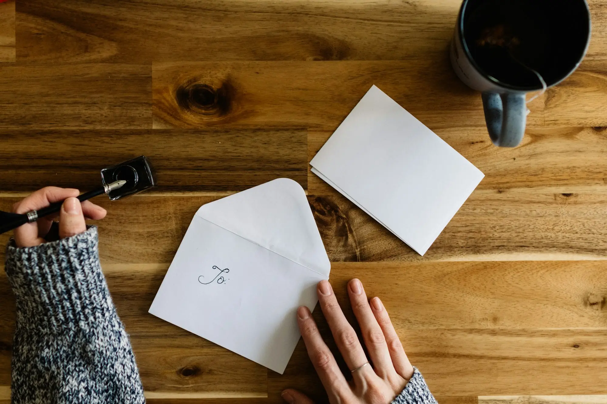Business owner reviewing an ATO letter while planning a bridging loan to buy new premises
