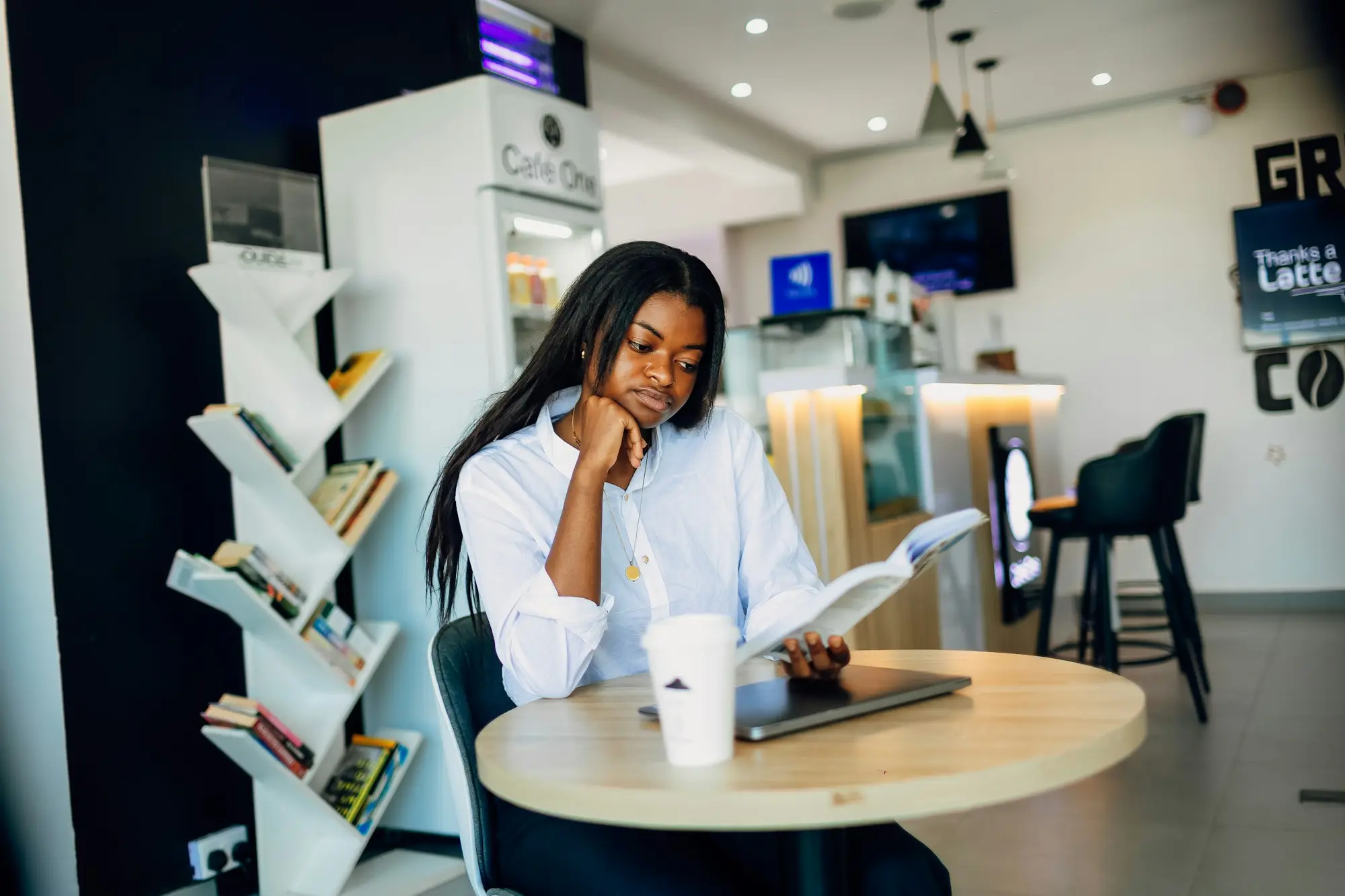 Business owner reviewing a chattel mortgage early payout statement at a desk before clearing the loan