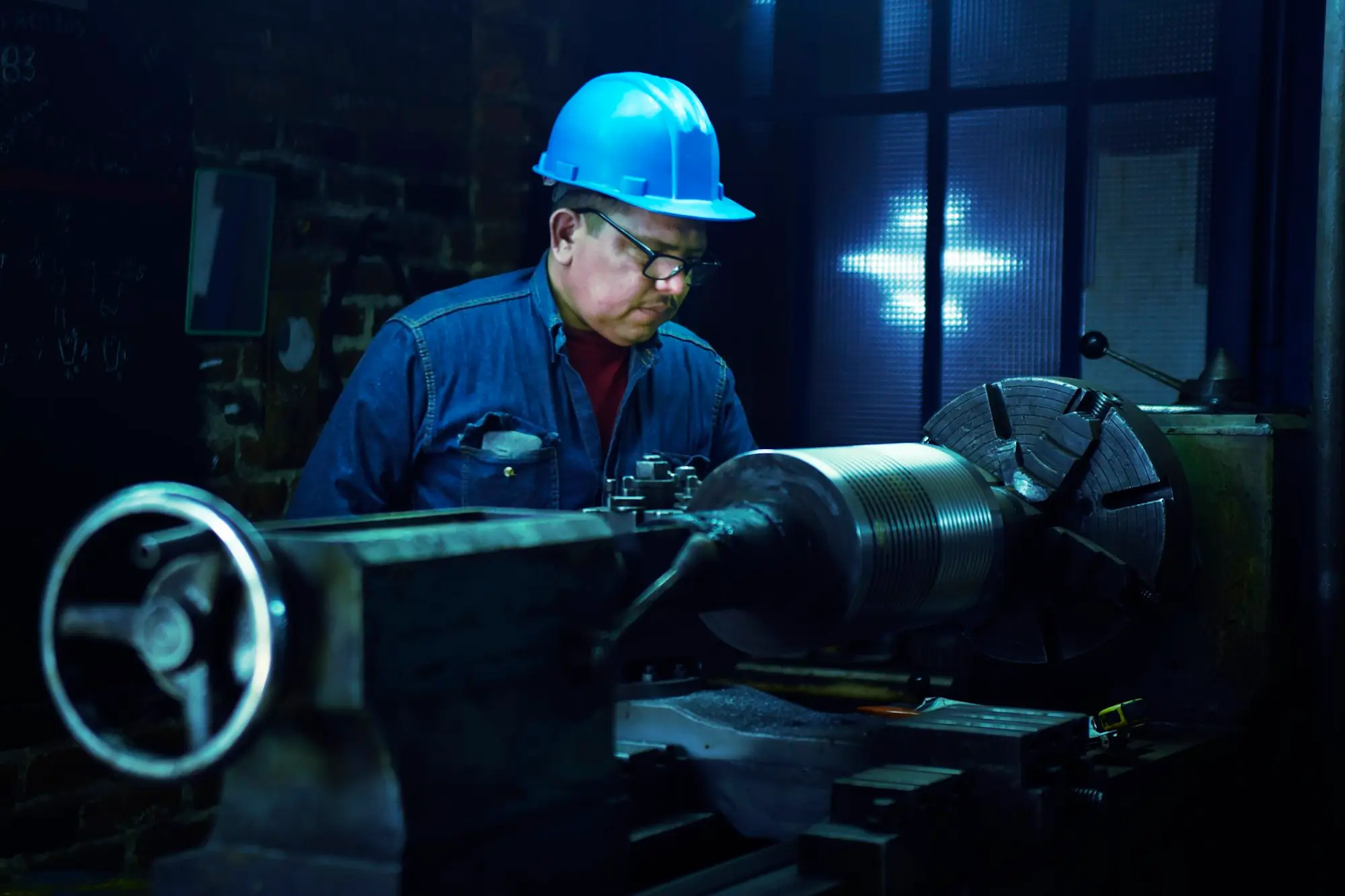 Custom-built industrial machine under construction in a fabrication workshop before delivery and finance settlement