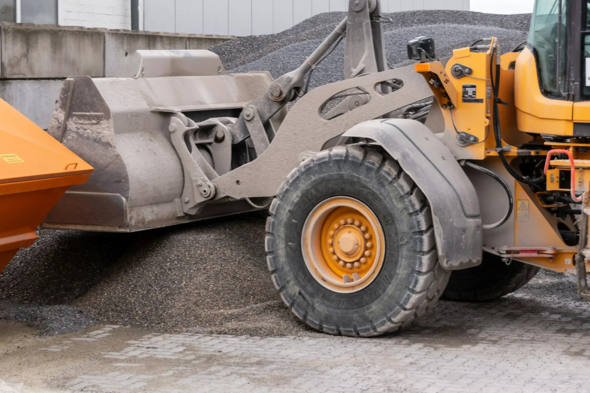 Valuer inspecting a wheel loader to value equipment for a sale and leaseback