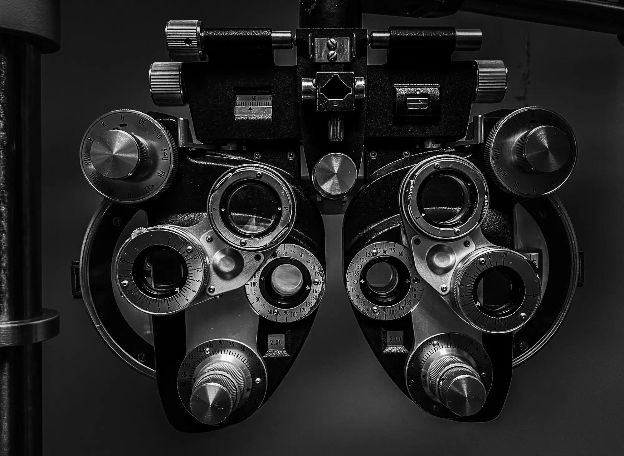 Optometrist using diagnostic eye-test equipment in an independent optometry practice