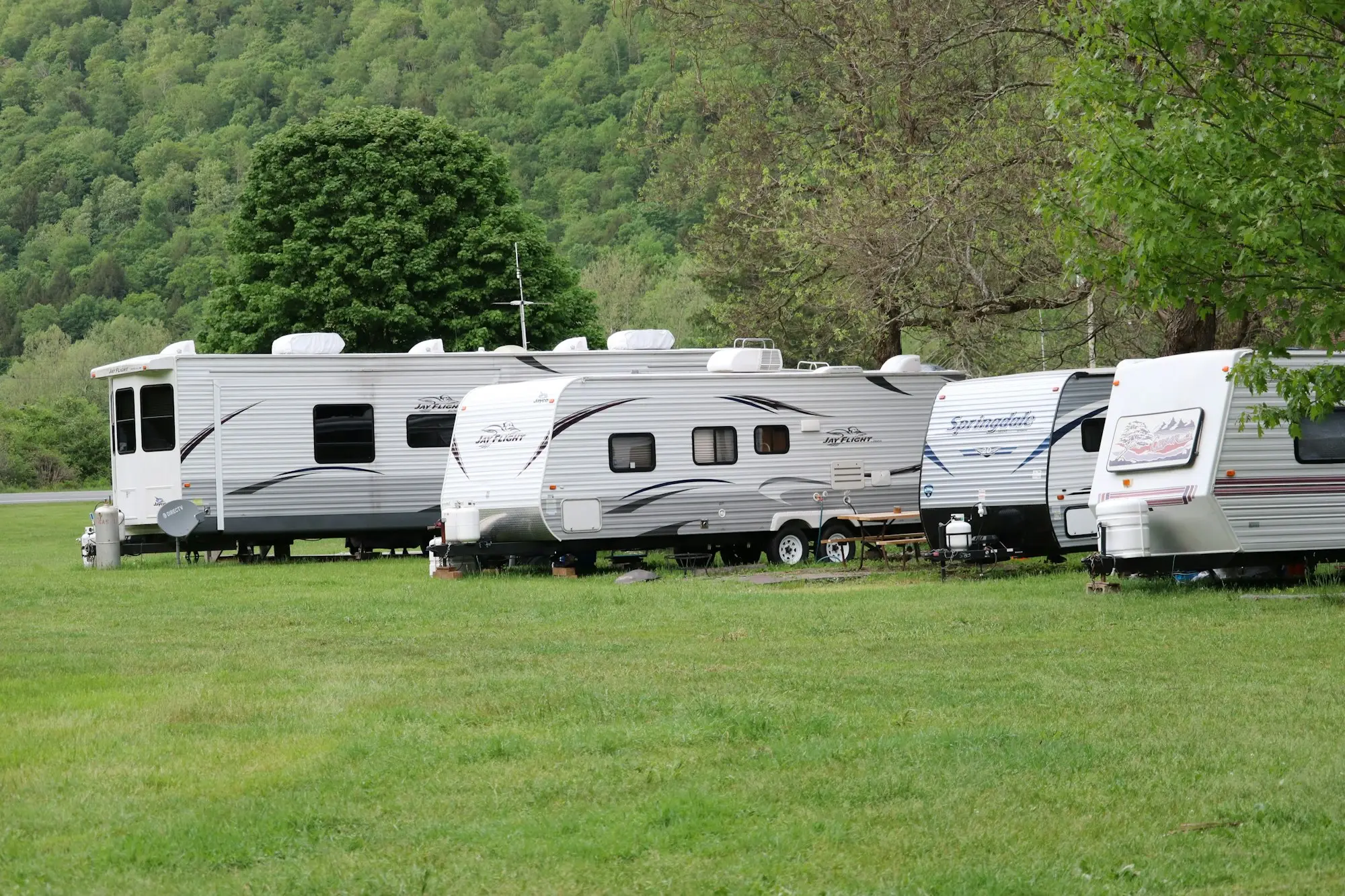 Rows of new caravans on a dealer yard, stock typically funded with floor plan finance