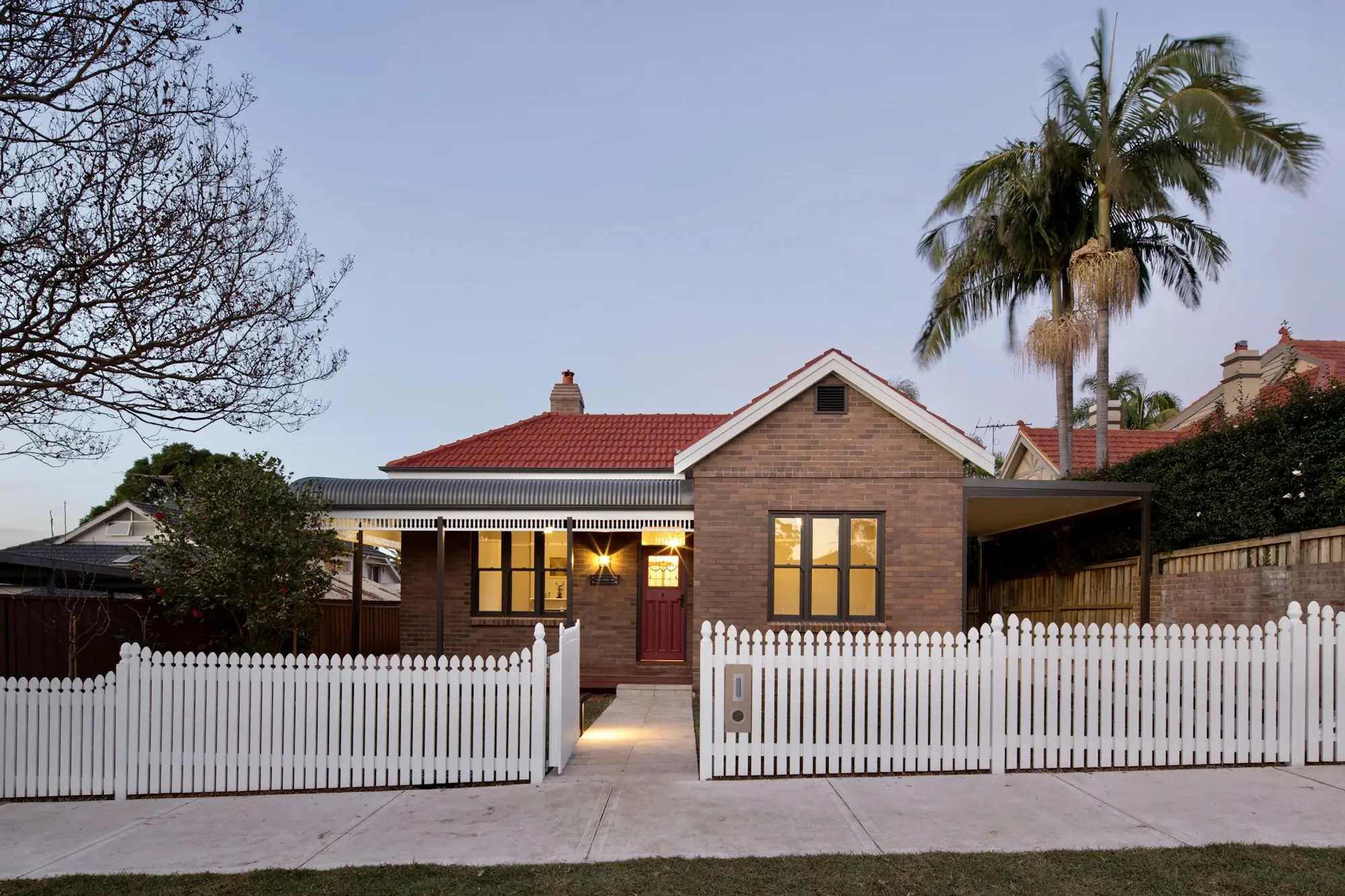 Australian brick home with a palm tree, equity that can be used for a business loan
