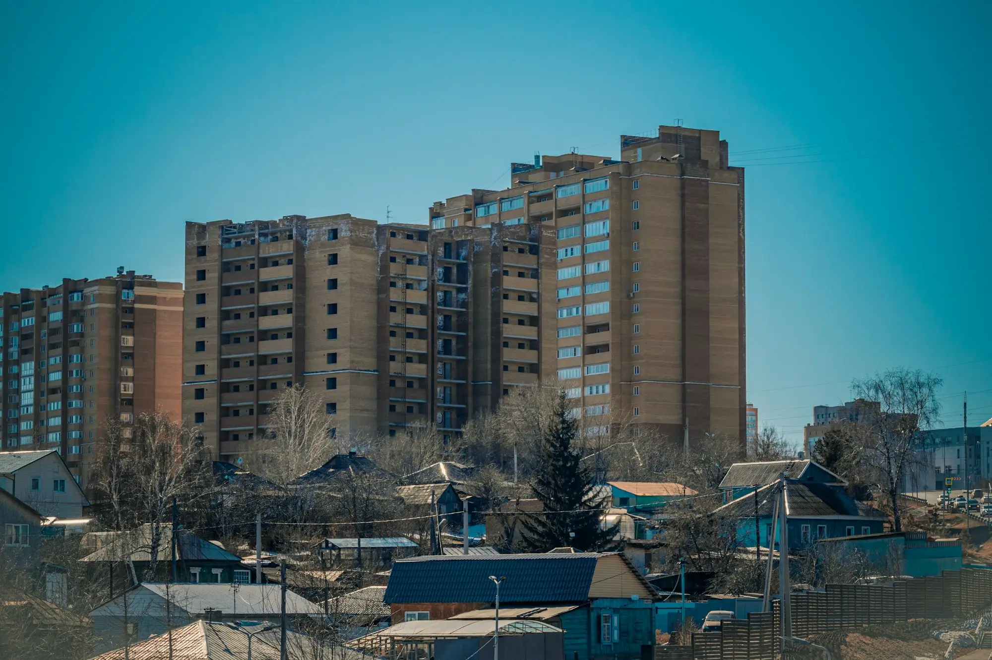 Vacant suburban corner block a developer is buying before the last project sells out, funded with a bridging loan