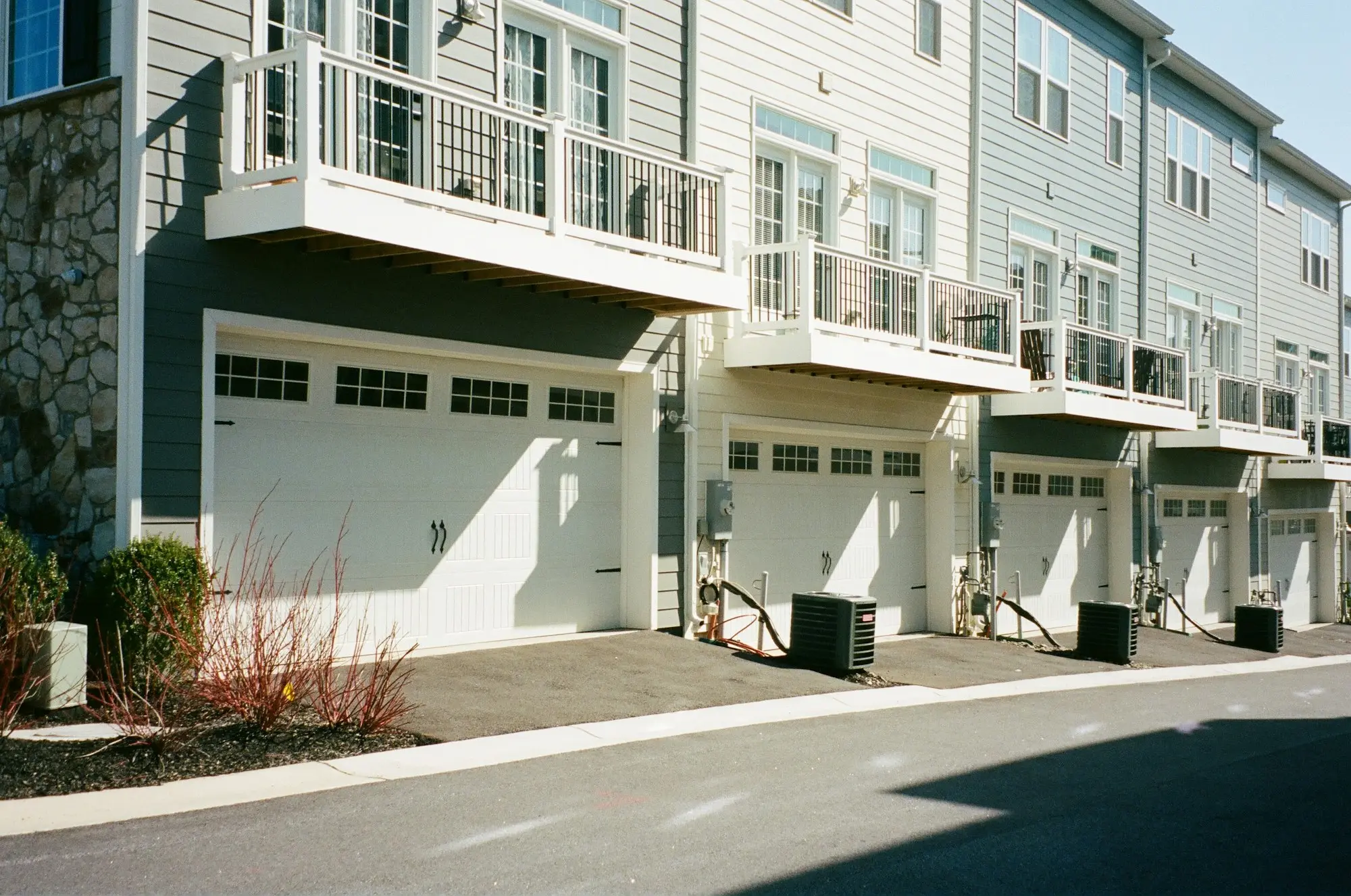 Row of newly completed townhouses with one still unsold after a presale fell through