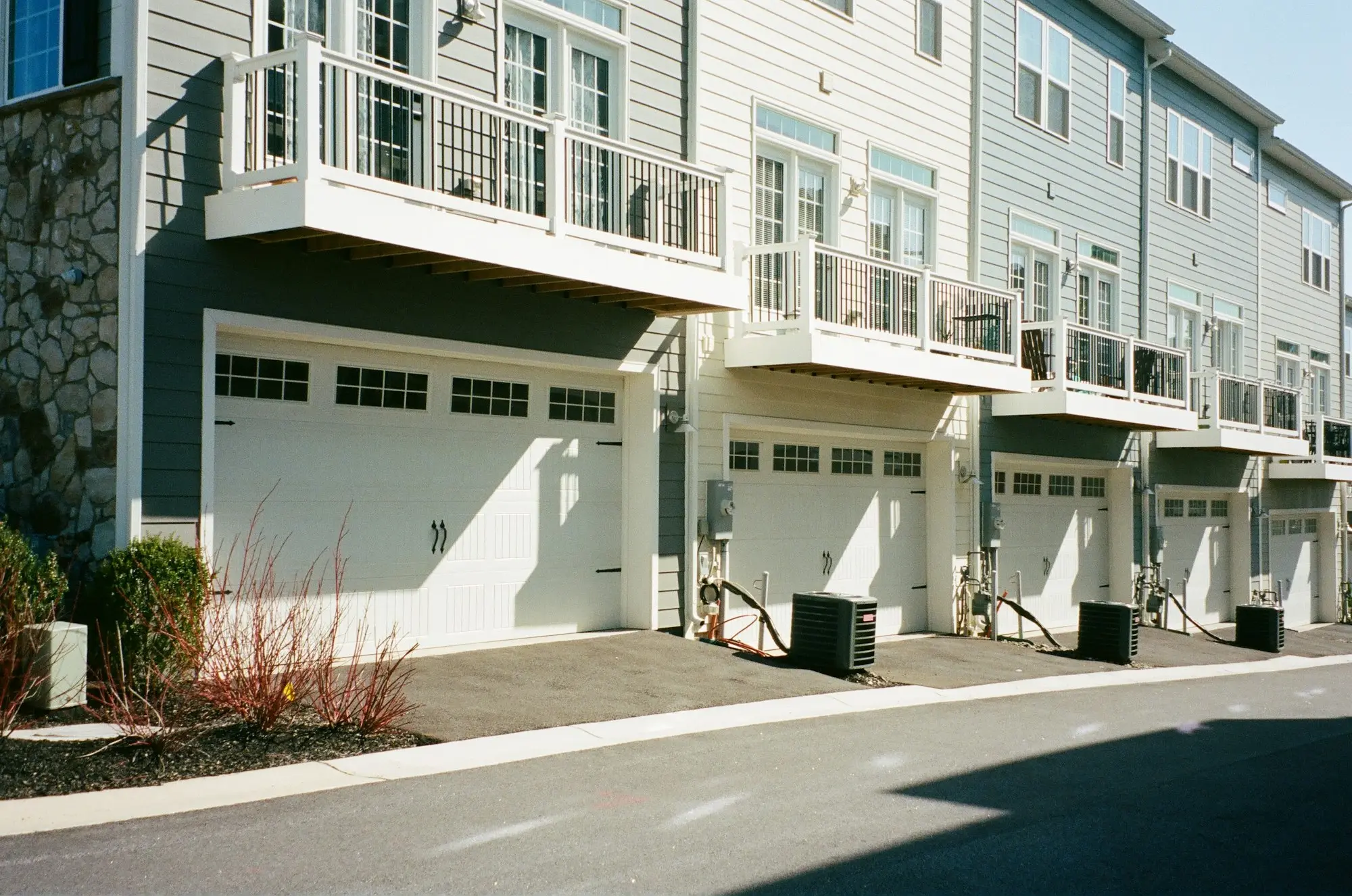 Row of newly completed townhouses with one still unsold after a presale fell through