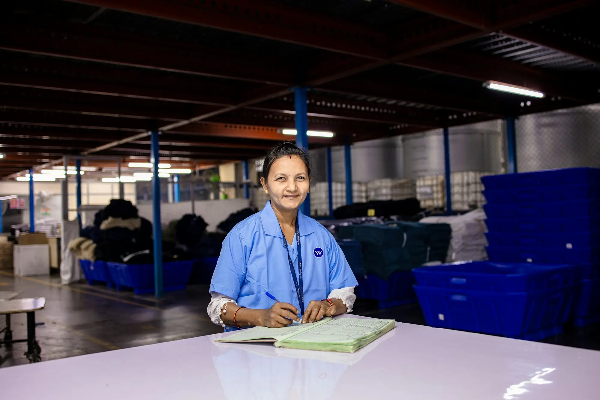 Business owner outside the factory her family trust owns and leases to her trading company under a related-party lease