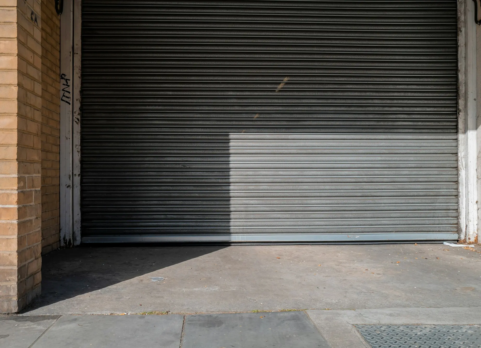 New strata industrial estate with roller-door warehouse units, some unsold, financed with a residual stock loan