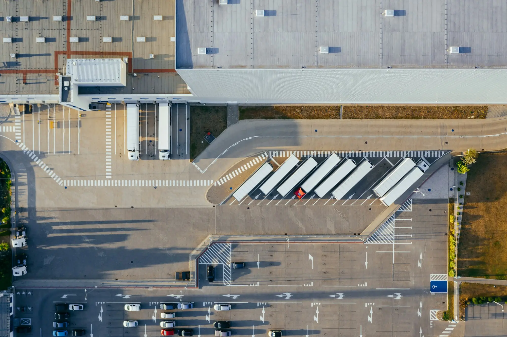 Prime movers parked at a regional transport depot, owned trucks used in a sale and leaseback to clear an ATO debt