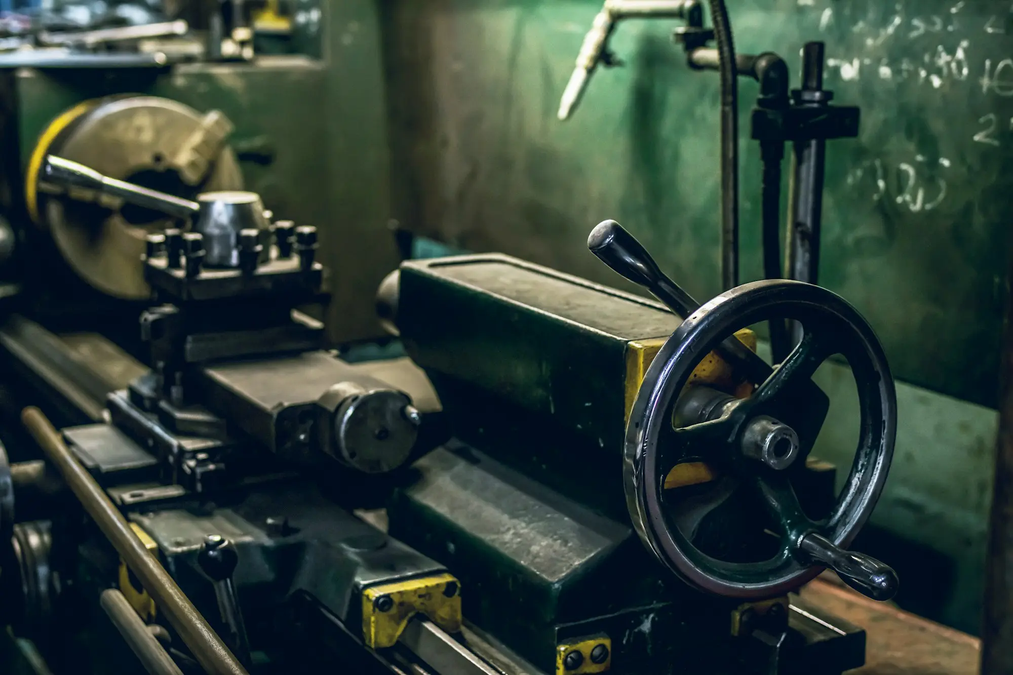Lathe machine in a workshop, owned equipment that can be released through a sale and leaseback
